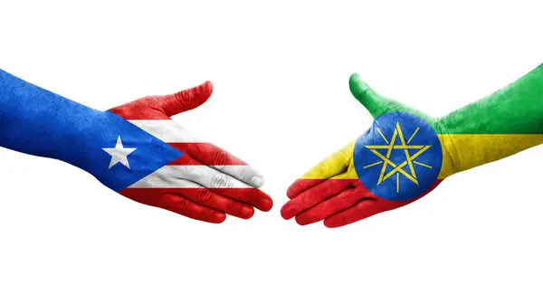 Händedruck Zwischen Äthiopien Und Puerto Rico Flaggen Auf Hände Gemalt — Stockfoto