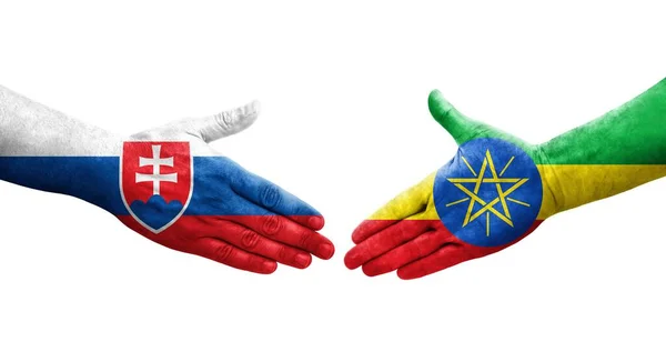 Handslag Mellan Etiopien Och Slovakien Flaggor Målade Händer Isolerad Transparent — Stockfoto