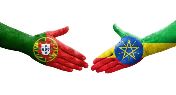 Uścisk Dłoni Między Etiopią Portugalskimi Flagami Namalowanymi Dłoniach Odizolowany Przezroczysty — Zdjęcie stockowe