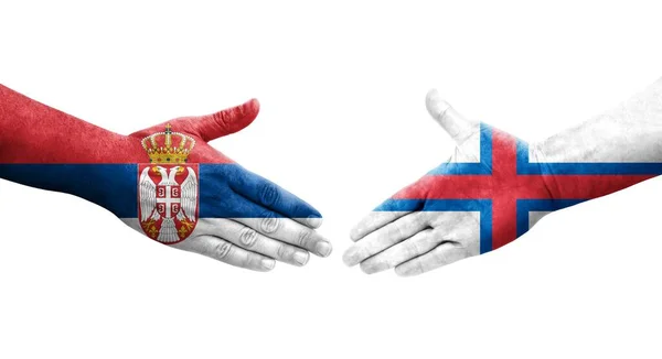 Händedruck Zwischen Färöer Inseln Und Serbien Flaggen Auf Hände Gemalt — Stockfoto
