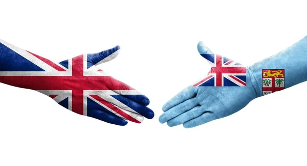 斐济和联合王国国旗之间的握手 孤立透明的图像 — 图库照片