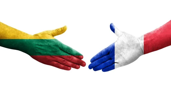 Mano Apretada Entre Las Banderas Francia Lituania Pintadas Las Manos — Foto de Stock