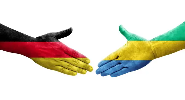 Stretta Mano Tra Gabon Germania Bandiere Dipinte Mani Immagine Isolata — Foto Stock