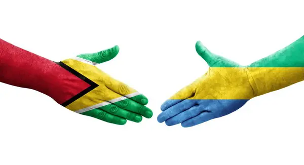 加蓬和圭亚那之间的握手 手绘国旗 孤立透明的形象 — 图库照片