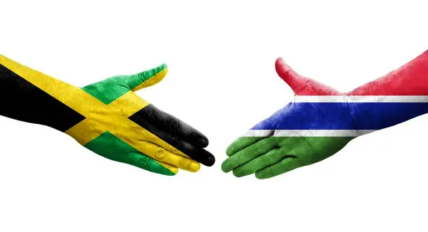 Рукопожатие Между Флагом Гамбии Ямайки Нарисованное Руках Изолированное Прозрачное Изображение — стоковое фото