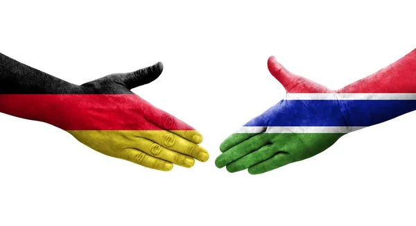 Uścisk Dłoni Między Gambią Niemcami Flagi Malowane Rękach Odizolowany Przezroczysty — Zdjęcie stockowe