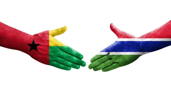 Χειραψία Μεταξύ Γκάμπια Και Γουινέα Μπισάου Σημαίες Ζωγραφισμένα Στα Χέρια — Φωτογραφία Αρχείου