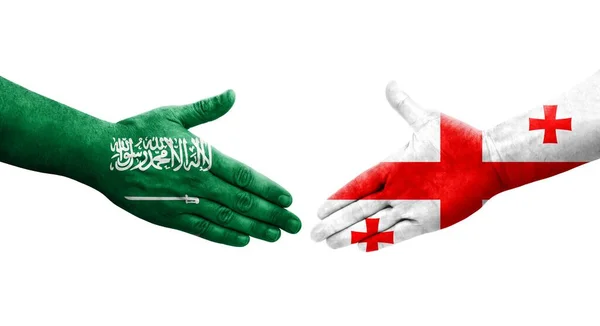 Handdruk Tussen Georgië Saoedi Arabië Vlaggen Handen Geschilderd Geïsoleerd Transparant — Stockfoto