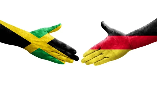 자메이카의 국기가 손으로 그려지는 가운데 이미지를 악수를 — 스톡 사진