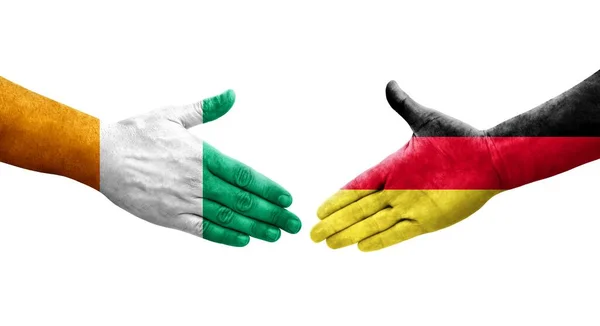 Aperto Mão Entre Alemanha Costa Marfim Bandeiras Pintadas Mãos Imagem — Fotografia de Stock