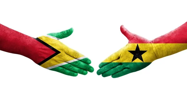 Stretta Mano Tra Bandiere Ghana Guyana Dipinte Mani Immagine Isolata — Foto Stock
