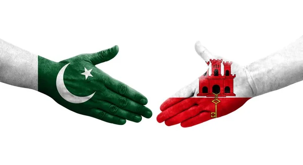 直布罗陀和巴基斯坦国旗之间的握手手绘 孤立透明的图像 — 图库照片