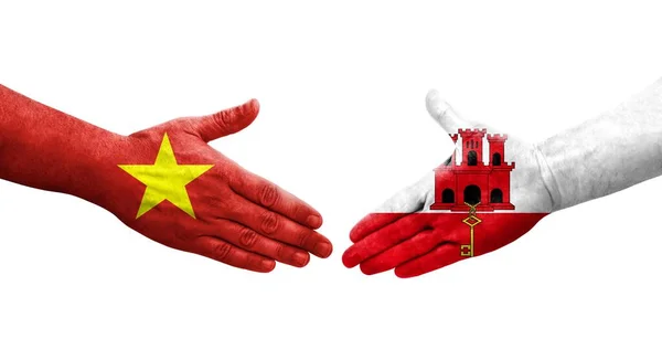 Рукостискання Між Гібралтарським Єтнамським Прапорами Намальоване Руках Ізольоване Прозоре Зображення — стокове фото
