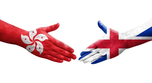 Handdruk Tussen Groot Brittannië Hong Kong Vlaggen Geschilderd Handen Geïsoleerd — Stockfoto