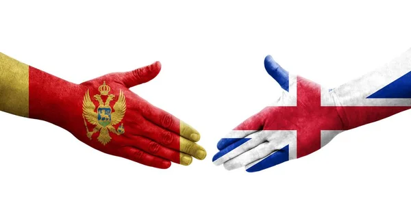 Stretta Mano Tra Gran Bretagna Montenegro Bandiere Dipinte Mani Isolata — Foto Stock