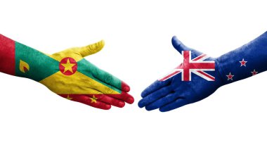 Grenada ve Yeni Zelanda bayrakları arasındaki el sıkışma, izole şeffaf görüntü.