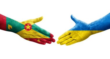 Grenada ve Ukrayna bayrakları arasındaki el sıkışma, izole şeffaf görüntü.