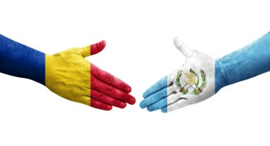 Guatemala ile Romanya bayrakları arasındaki el sıkışma, izole edilmiş şeffaf görüntü.