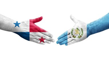 Guatemala ve Panama bayrakları arasındaki tokalaşma elleri boyalı, izole şeffaf görüntü.