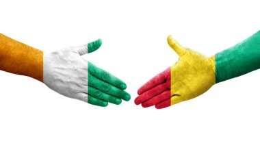 Gine ve Fildişi Sahili bayrakları arasında el sıkışma, izole şeffaf görüntü.