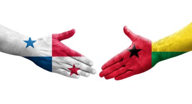 Ellerinde Gine Bissau ve Panama bayrakları arasında el sıkışma, izole saydam görüntü.