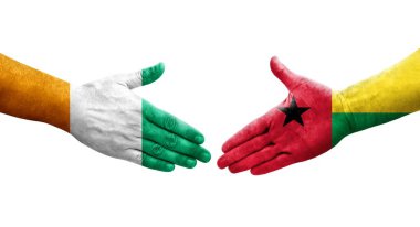 Gine Bissau ve Fildişi Sahili bayrakları arasındaki el sıkışma..