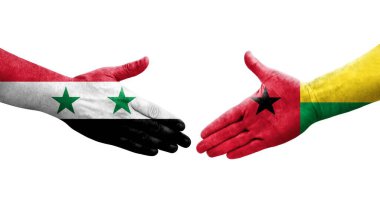 Gine Bissau ve Suriye bayrakları arasındaki el sıkışma, izole şeffaf görüntü.