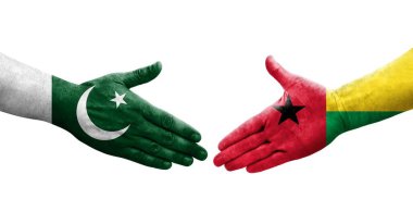 Gine Bissau ve Pakistan bayrakları arasındaki el sıkışma, izole şeffaf görüntü.