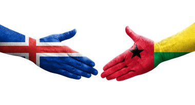Gine Bissau ve İzlanda bayrakları arasındaki el sıkışma, izole şeffaf görüntü.