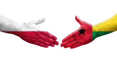 Gine Bissau ve Polonya bayrakları arasındaki el sıkışma, izole şeffaf görüntü.