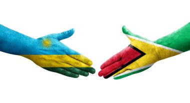 Guyana ve Ruanda bayrakları arasındaki el sıkışma ellerinde izole şeffaf görüntü.