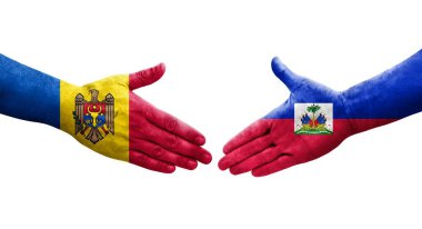 Ellerinde Haiti ve Moldova bayrakları arasında el sıkışma, izole şeffaf görüntü.