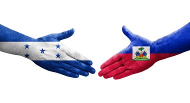 Haiti ve Honduras bayrakları arasında el sıkışma, izole şeffaf görüntü.