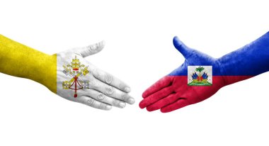 Haiti ve Kutsal Bakış arasındaki el sıkışma ellerinde bayraklar, yalıtılmış şeffaf görüntü.