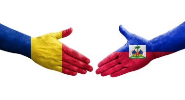 Haiti ve Romanya bayrakları arasındaki el sıkışma, izole şeffaf görüntü.