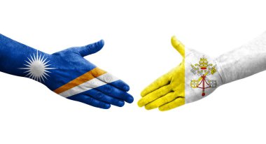 Kutsal Bakış ve Marshall Adaları arasındaki el sıkışma ellerinde boyanmış bayraklar, yalıtılmış şeffaf görüntü.