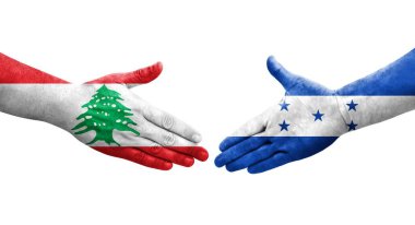 Honduras ve Lübnan bayrakları arasındaki el sıkışma ellerinde resmedilmiş şeffaf görüntü.
