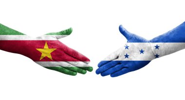 Honduras ve Surinam bayrakları arasında el sıkışma, izole şeffaf görüntü.