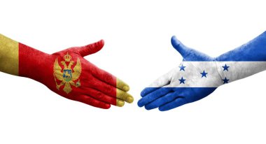 Honduras ve Karadağ bayrakları arasındaki el sıkışma, izole şeffaf görüntü.