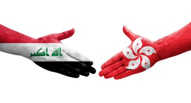 Hong Kong ve Irak bayrakları arasında el sıkışma, izole şeffaf görüntü.