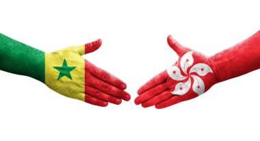Hong Kong ve Senegal bayrakları arasındaki el sıkışma..