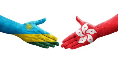 Hong Kong ve Ruanda bayrakları arasındaki el sıkışma ellerinde resmedilmiş şeffaf görüntü.