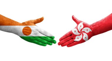 Hong Kong ve Nijer bayrakları arasında el sıkışma..