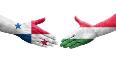 Ellerinde Macaristan ve Panama bayrakları arasında el sıkışma, izole saydam görüntü.