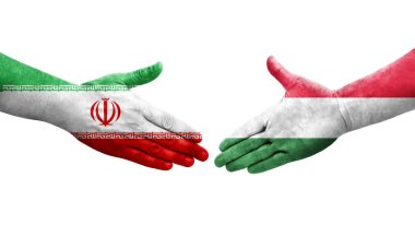 Ellerinde Macaristan ve İran bayrakları arasında el sıkışma, izole şeffaf görüntü.