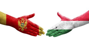 Macaristan ve Karadağ bayrakları arasındaki el sıkışma, izole şeffaf görüntü.