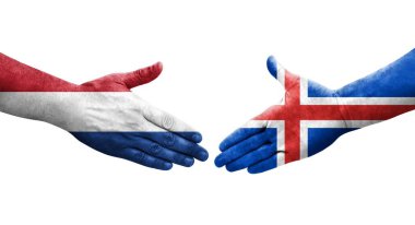 İzlanda ve Hollanda bayrakları arasında el sıkışma, izole şeffaf görüntü.