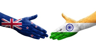 Hindistan ve Yeni Zelanda bayrakları arasında el sıkışma, izole şeffaf görüntü.
