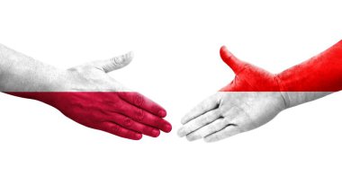 Endonezya ve Polonya bayrakları arasında el sıkışma, izole edilmiş şeffaf görüntü.
