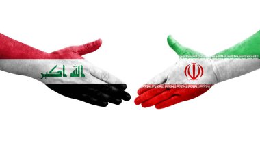 İran ve Irak bayrakları arasında el sıkışma, izole şeffaf görüntü.